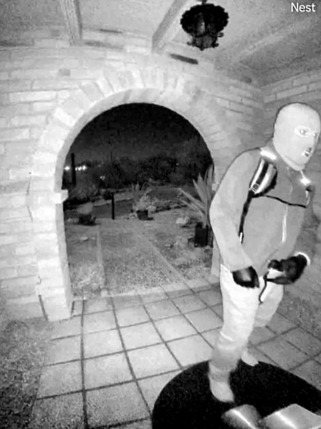 FBI Releases Critical Footage: Suspect in Reflective Jacket and Holster Seen Tampering with Doorbell Camera