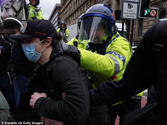Violence Erupts in Manchester as Far-Right Group Britain First Clashes with Counter-Demonstrators, 11 Arrested