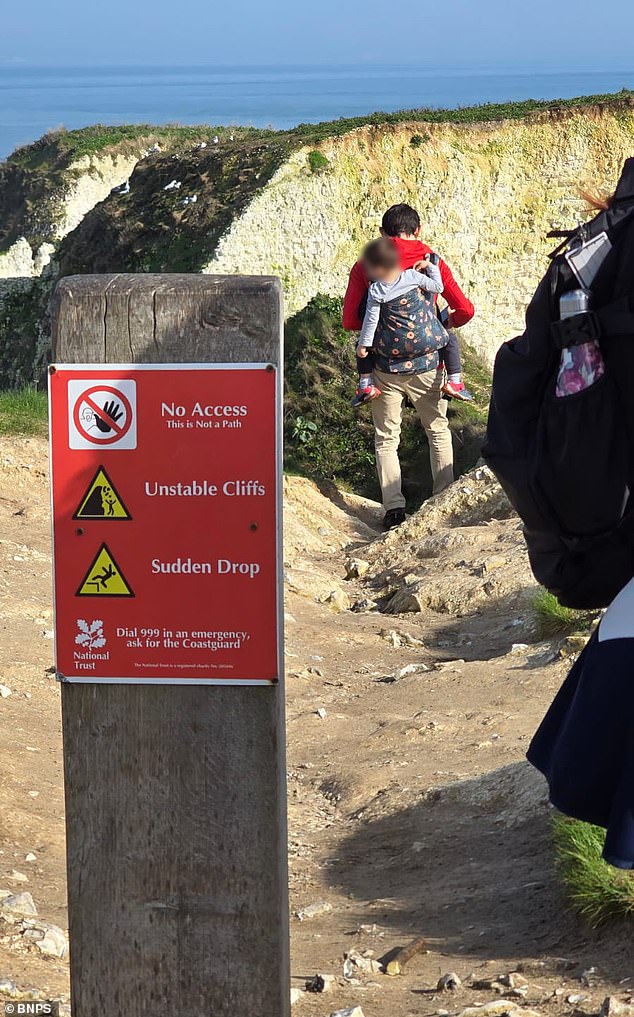 Daring Dad Defies Warnings by Taking Child on Precarious Dorset Cliffs