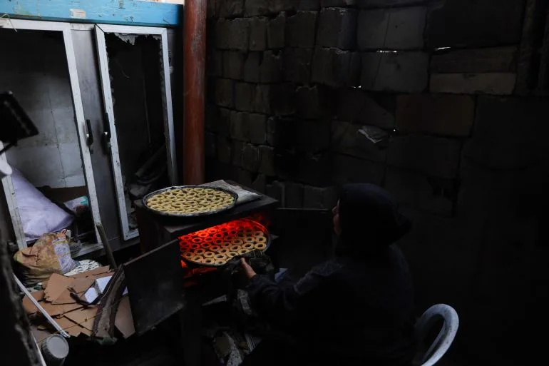 Baking in rubble: Gaza woman keeps Eid traditions alive despite shortages