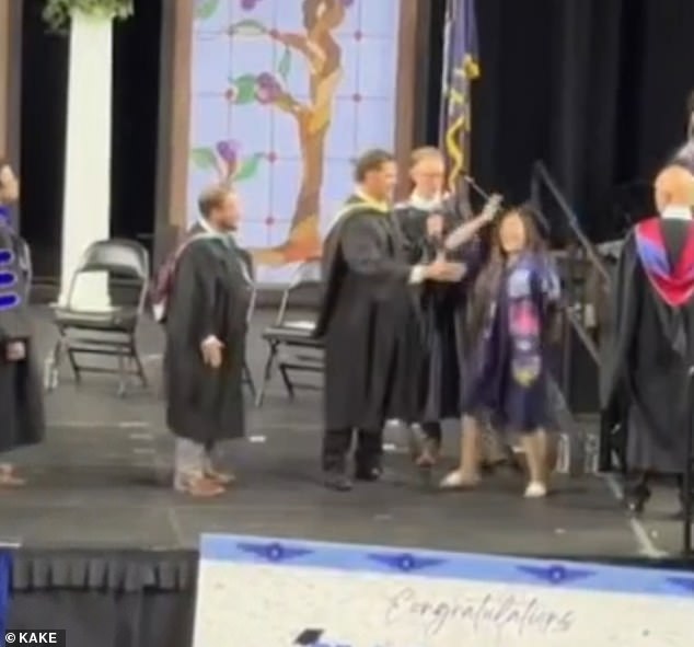 School Administrator Physically Restrains Graduates During Kansas Diploma Ceremony