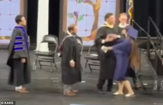 School Administrator Physically Restrains Graduates During Kansas Diploma Ceremony