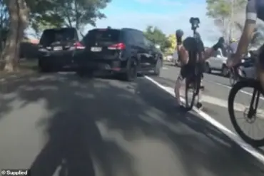 Cyclist's Close Call With Oncoming SUV