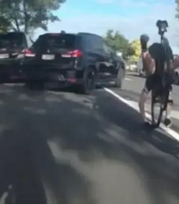 Cyclist's Close Call With Oncoming SUV