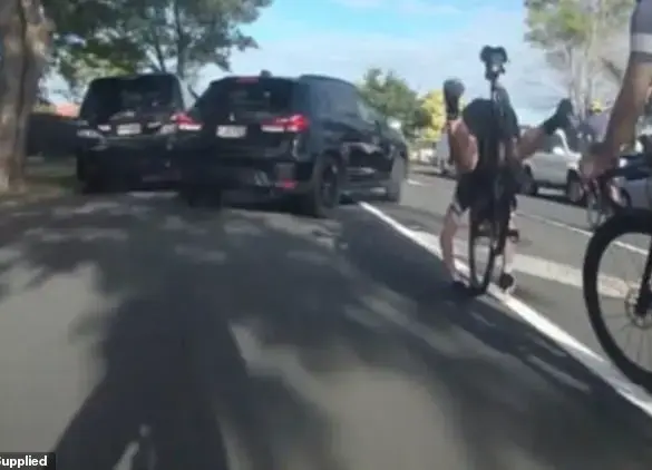 Cyclist's Close Call With Oncoming SUV