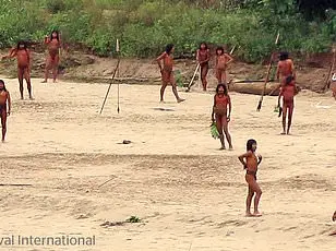 Uncontacted Amazonian Tribe Member Meets Modern Technology