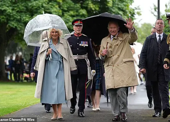 King Charles and Queen Camilla Unveil Time Capsule at Kirkcaldy War Memorial Centenary Despite Rain