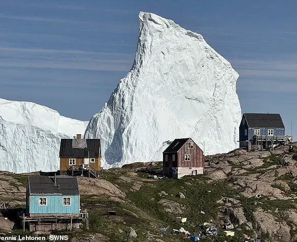 Massive Iceberg Drifting Near Greenland's Coast Sparks Concern Among Authorities and Residents