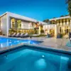 Young Man Arrested in Double Murder of American Idol Executive and Musician Husband: Evidence Indicates Prior Service Worker Visit to Victims' $5 Million Mansion
