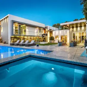 Young Man Arrested in Double Murder of American Idol Executive and Musician Husband: Evidence Indicates Prior Service Worker Visit to Victims' $5 Million Mansion