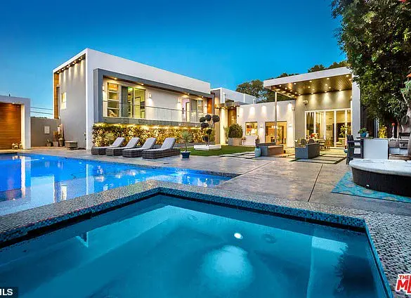 Young Man Arrested in Double Murder of American Idol Executive and Musician Husband: Evidence Indicates Prior Service Worker Visit to Victims' $5 Million Mansion